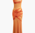 an orange dress with a bow on it