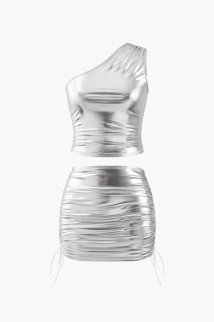 a silver dress on a white background