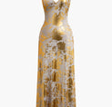 a gold and white dress on a white background