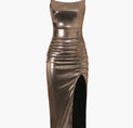 a metallic dress with a slit on the side