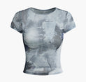 a women ' s t - shirt with an abstract print
