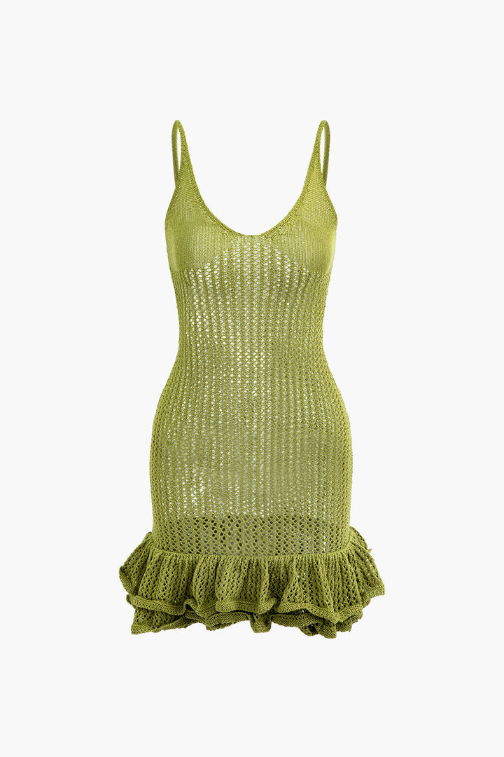 a women ' s green tank top with ru detailing