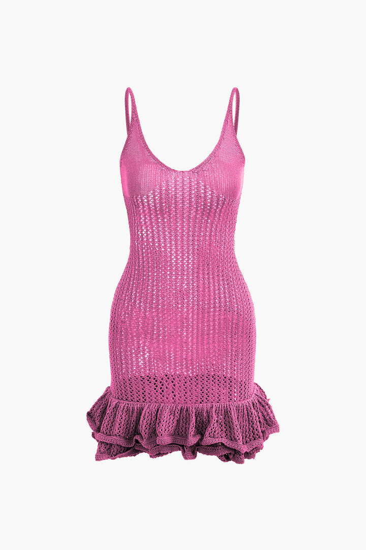 a women ' s pink knit tank top with ru detailing