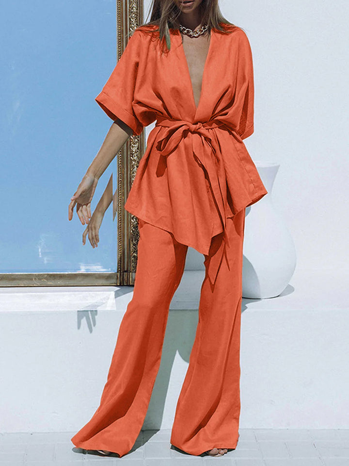 a woman in an orange jumpsuit