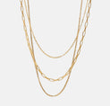 a gold chain necklace on a white background