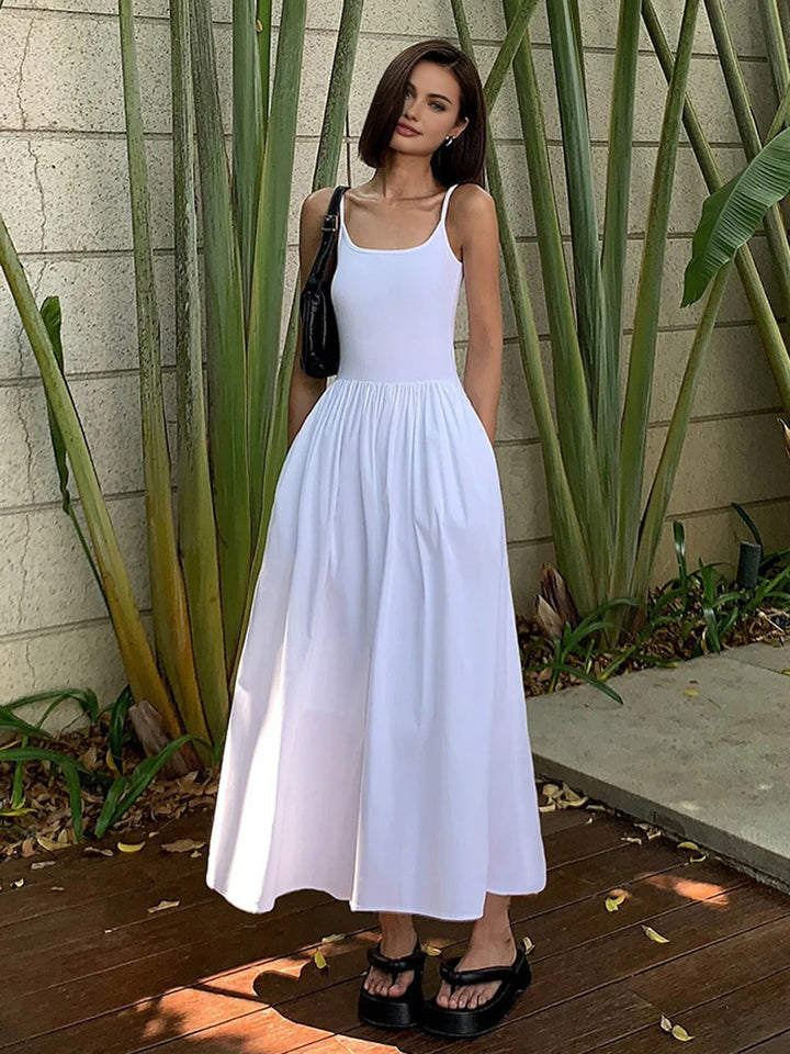 the girl is wearing a white dress