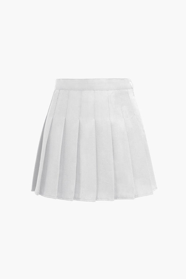 a white skirt with plea detailing
