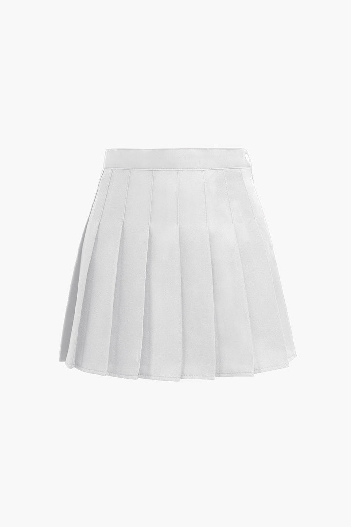 a white skirt with plea detailing