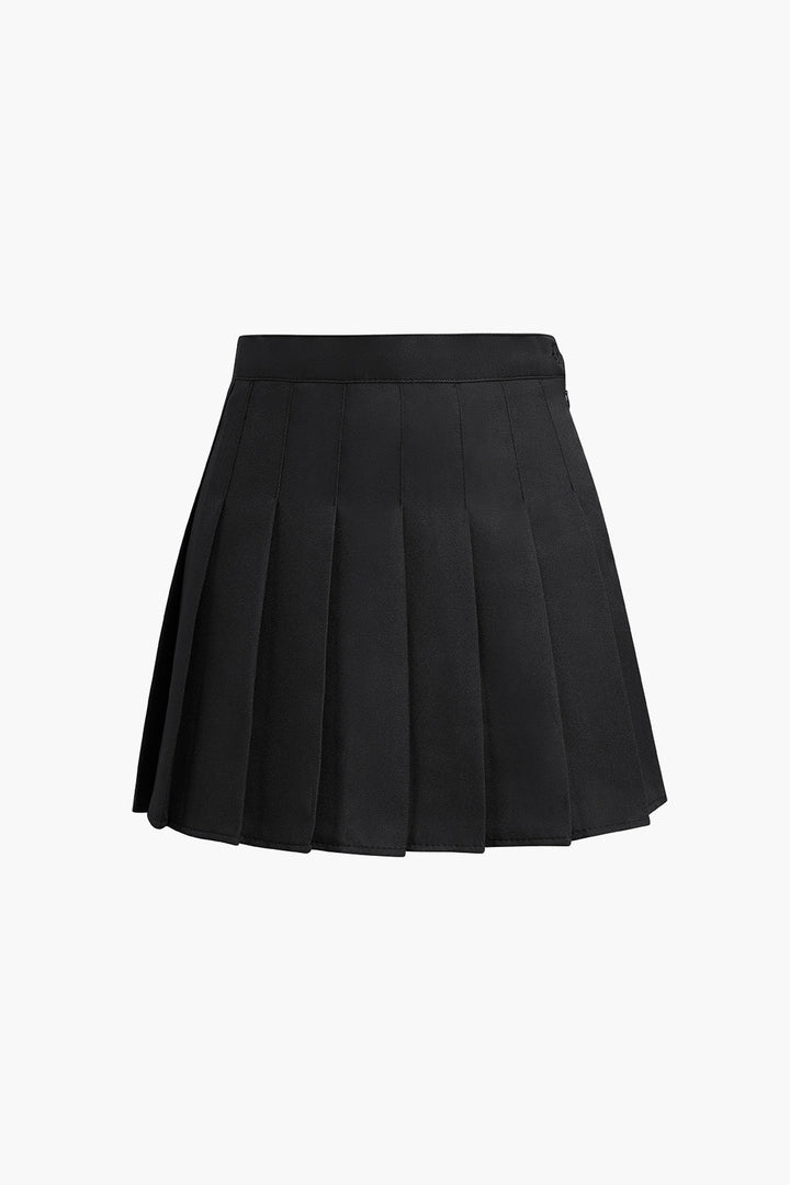 a black skirt with plea detailing
