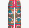 a photo of a woman wearing colorful patterned pants