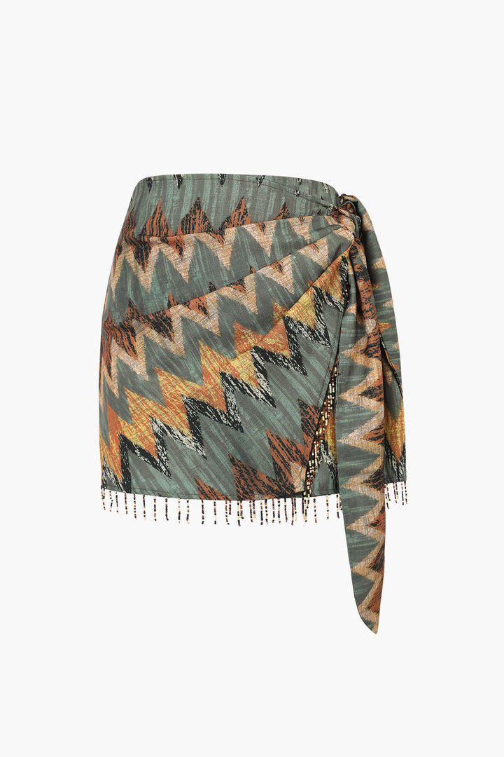 a top with a pattern and fringes on it