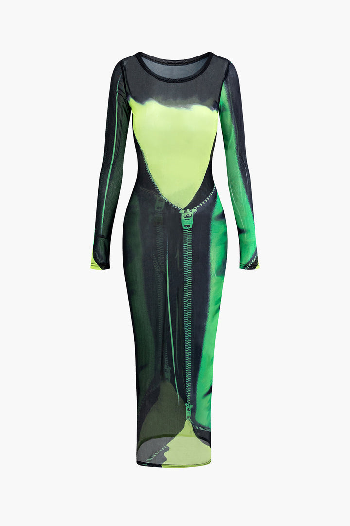 a green and black dress on a white background