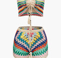 a pair of shorts with multi colored croches