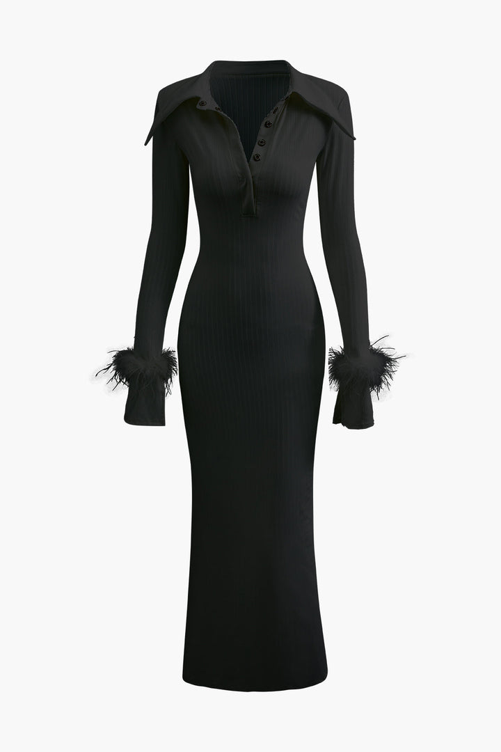 a black dress with feathers on the shoulders