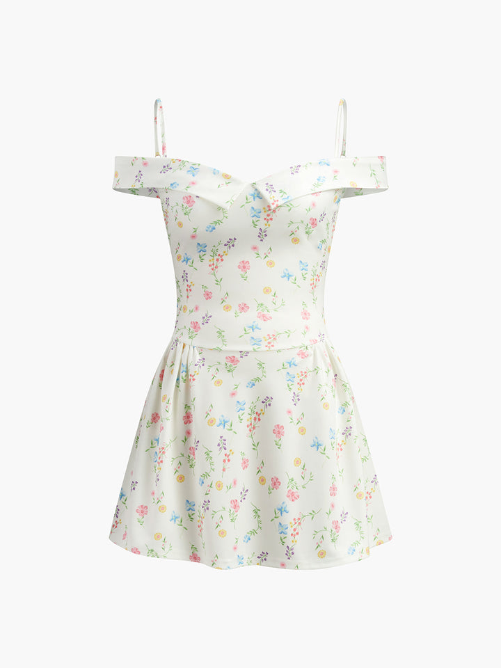 a white dress with a floral print on it
