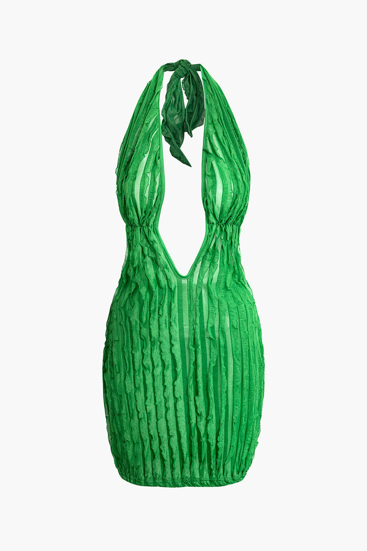 a green bag on a white background