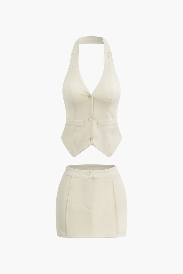 a woman in a white top and shorts