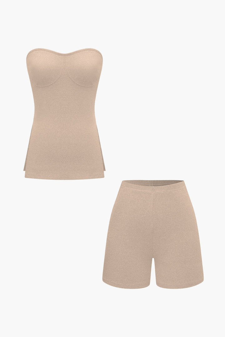 a woman wearing a tan top and shorts