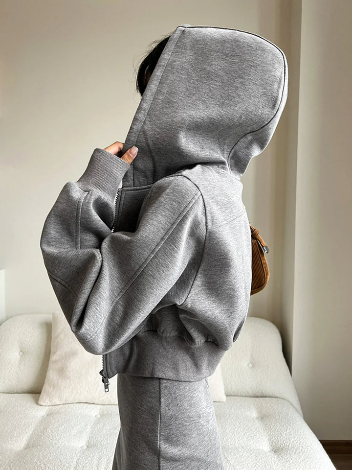 a woman wearing a hoodie