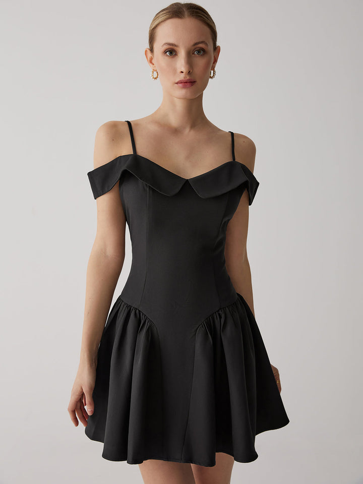 a model in a black dress