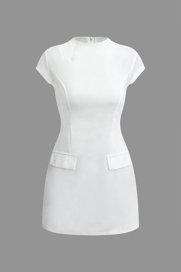 a white dress with pockets on the front