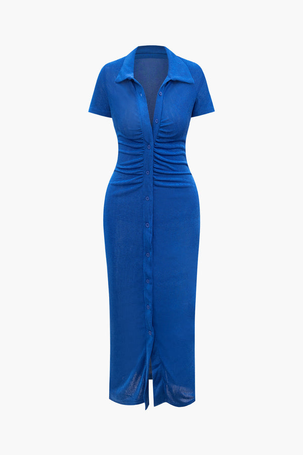 a women ' s blue dress with short sleeves and buttons