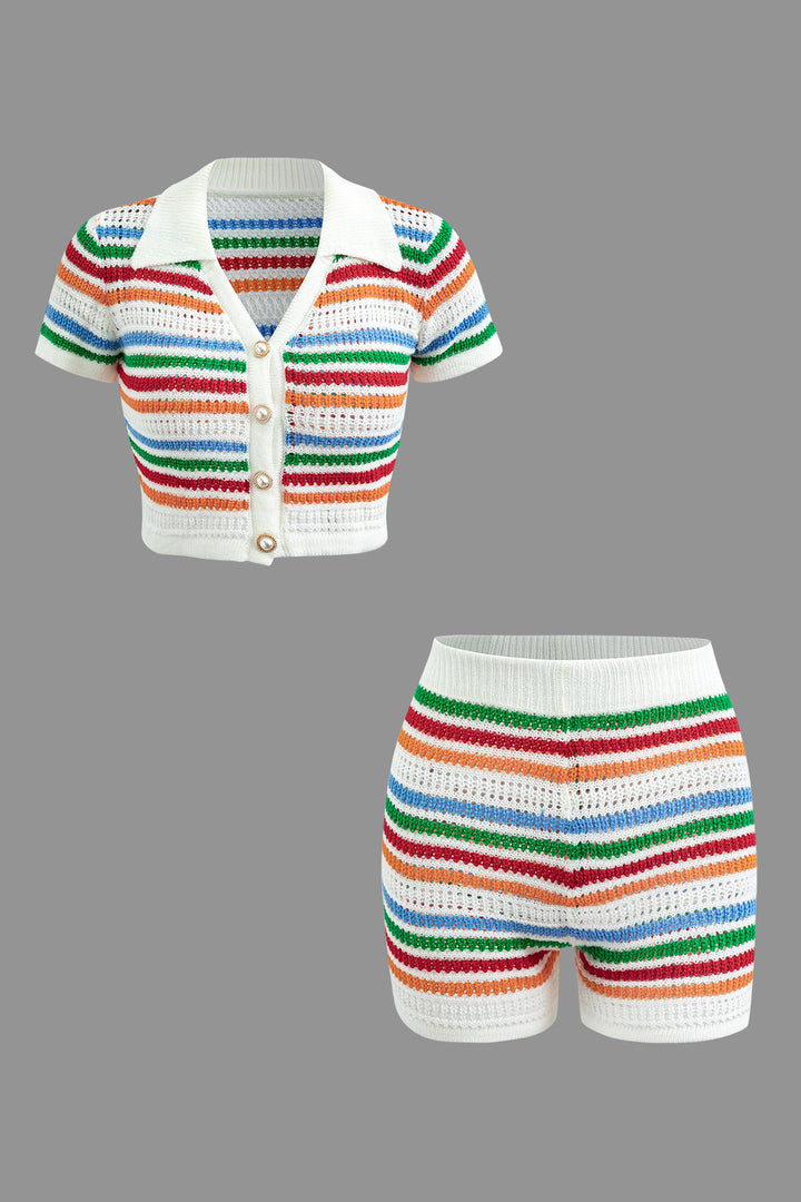 a pair of white shorts and a white shirt with colorful stripes