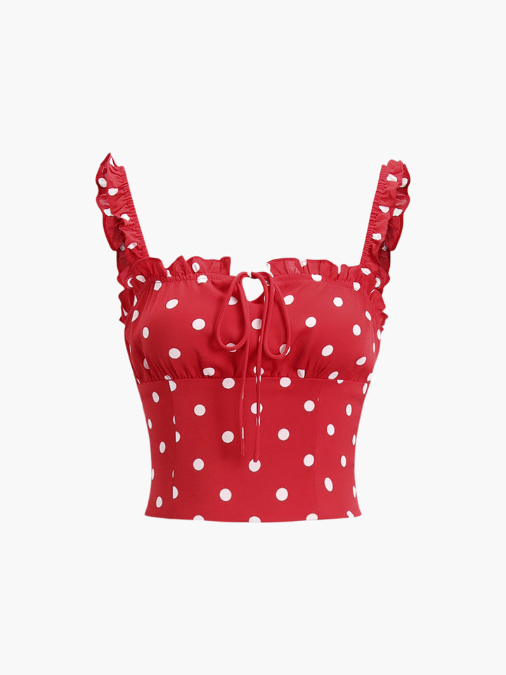 a red top with white polka dots on it