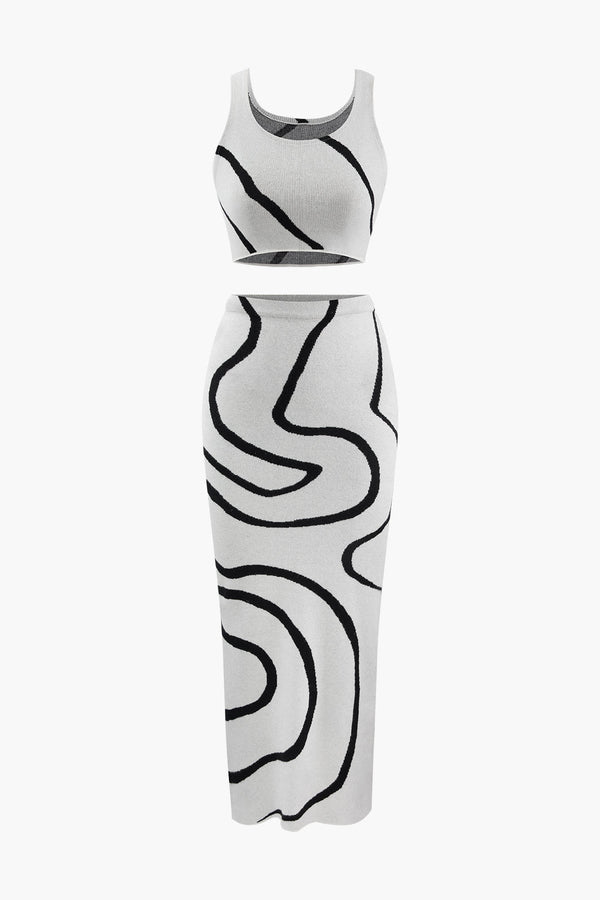 a white and black dress with a black and white pattern