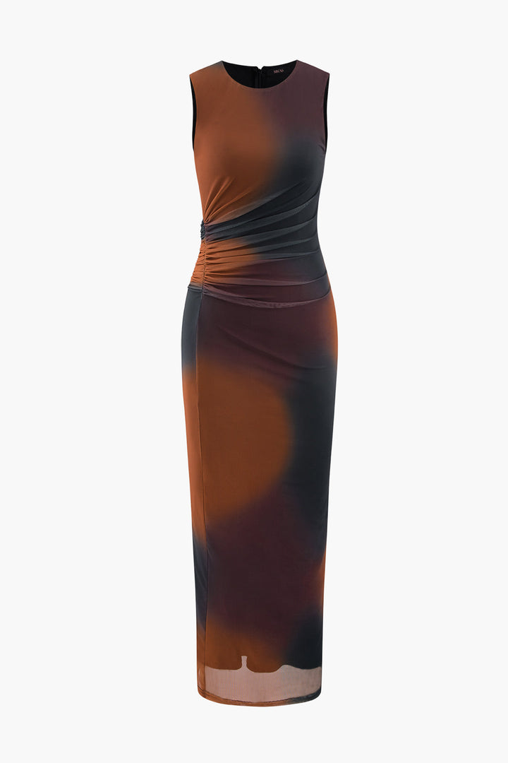 a women ' s dress with a brown and black print