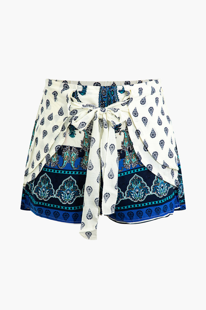 a white shorts with a blue paisley print on it