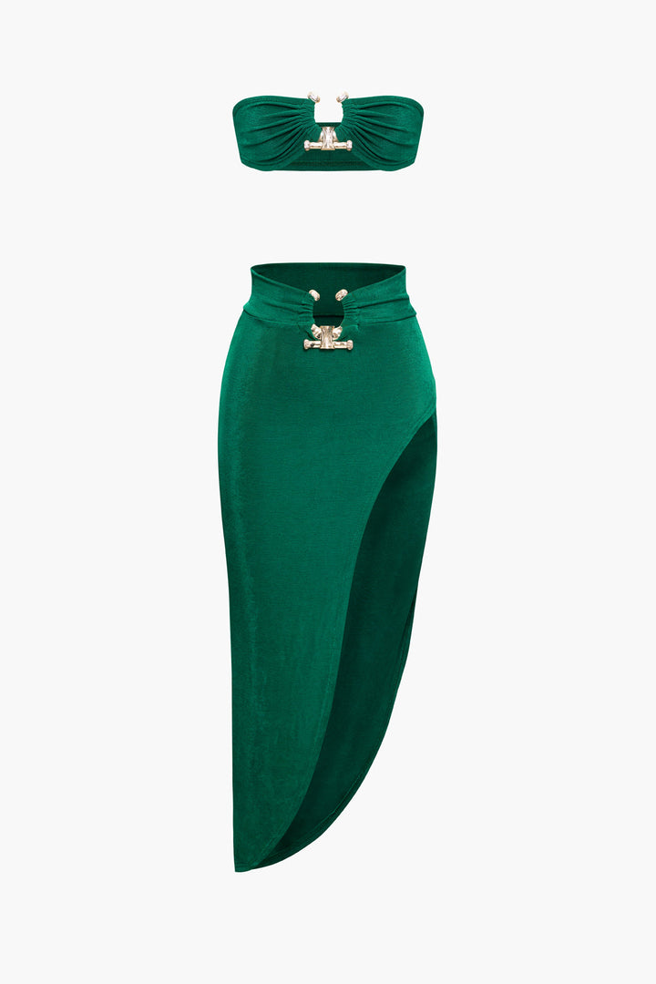 a green skirt and top with a gold buckle