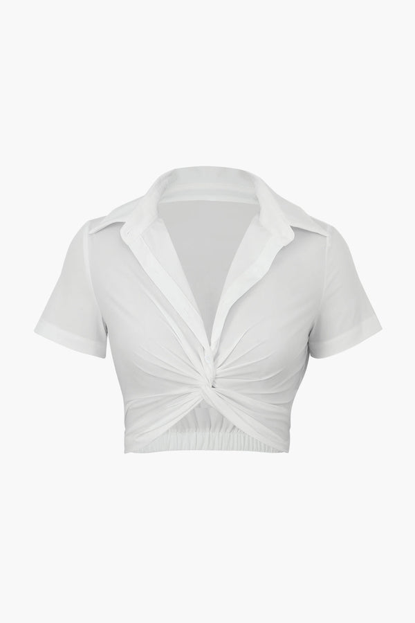 a white crop top with a knotted front