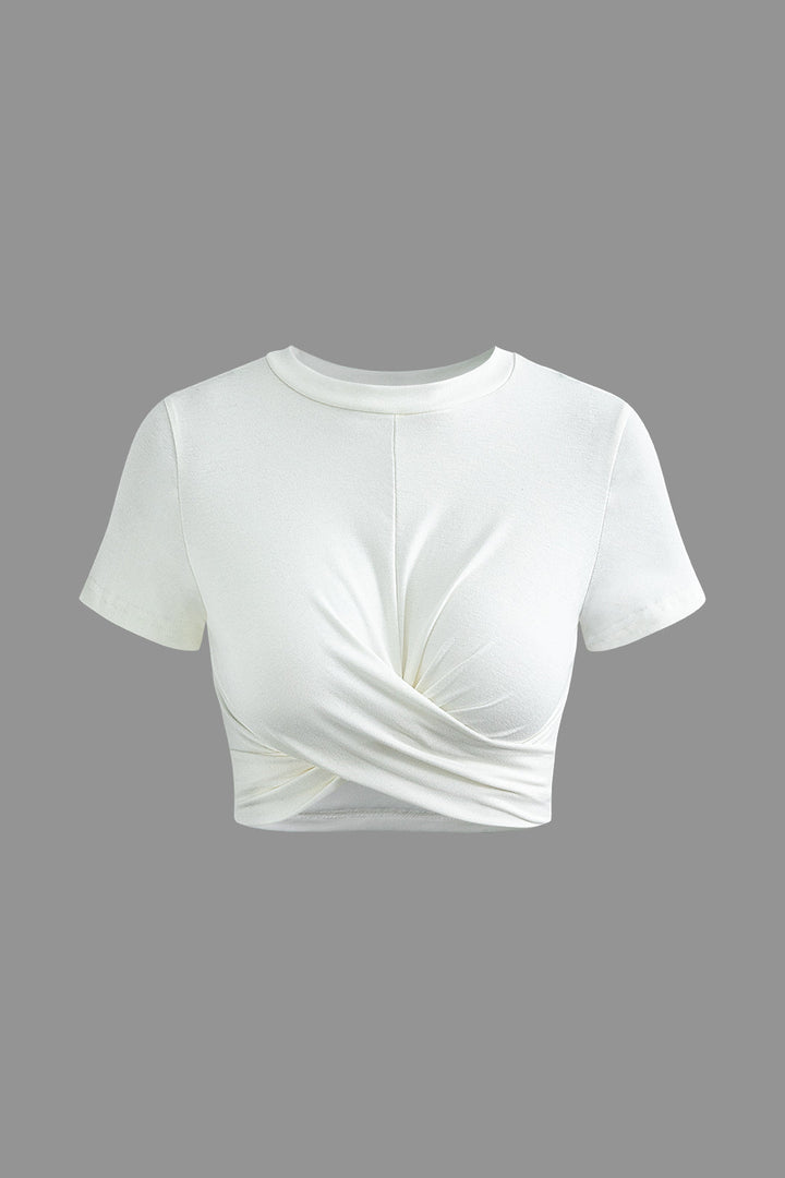 a white t - shirt with a knot on the front