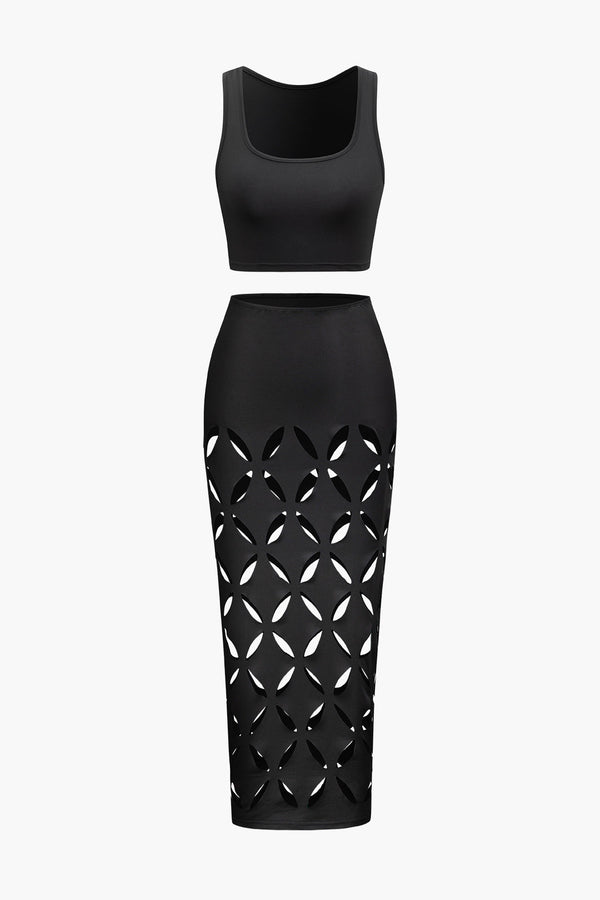 a black dress with cutouts on the sides