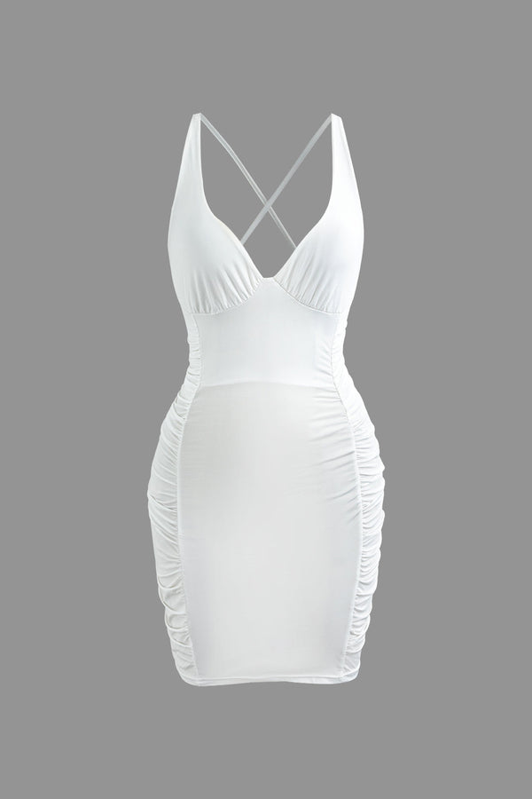 a white swimsuit with spaghetti straps