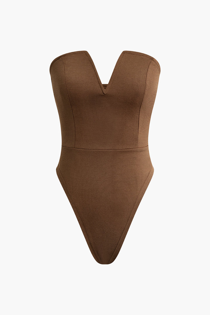 a brown bodysuit on a white background
