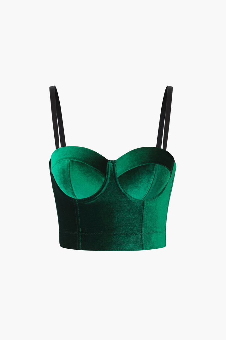 a green velvet bra top with black straps