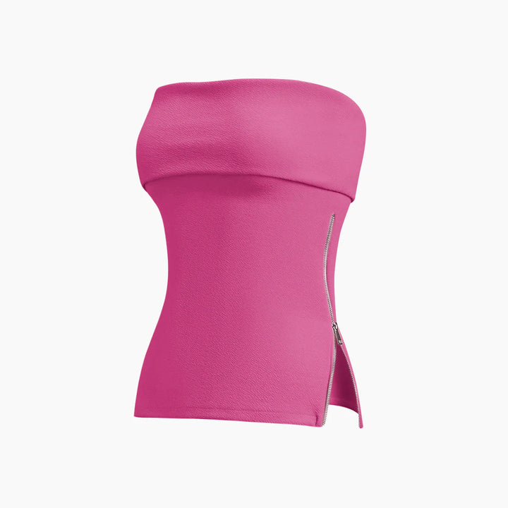 a pink top with zippers on it